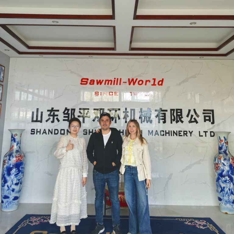 Colombian clients visiting Sawmillworld factory to inspect high-quality sawmill machinery.